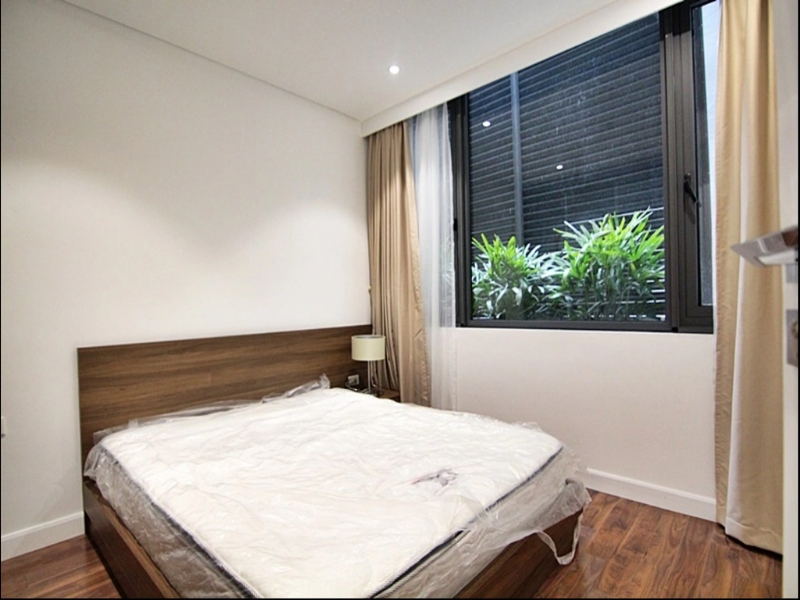 Bright serviced apartment for rent on Tay Ho St 13